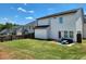 Expansive backyard with a lush lawn and fence, providing a private and secure outdoor space at 1132 Red Bud Cir, Villa Rica, GA 30180