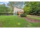 The spacious backyard features a charming deck, lush greenery, and mature trees at 2789 Brookcliff Lndg, Marietta, GA 30062