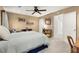 Neutral bedroom featuring carpet, a ceiling fan, and a view to an en-suite bath at 2789 Brookcliff Lndg, Marietta, GA 30062