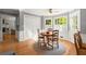 Sunlit dining area with hardwood floors and large windows overlooking the backyard at 2789 Brookcliff Lndg, Marietta, GA 30062