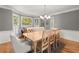 This dining room features a wood table and many windows for natural light at 2789 Brookcliff Lndg, Marietta, GA 30062