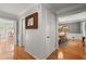 Hallway with hardwood floors leading to dining and living areas, next to the staircase at 2789 Brookcliff Lndg, Marietta, GA 30062