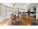 Eat-in kitchen with white cabinets, stainless steel appliances, and a dining area at 2789 Brookcliff Lndg, Marietta, GA 30062