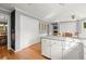Spacious kitchen with white cabinets, a center island, and hardwood floors at 2789 Brookcliff Lndg, Marietta, GA 30062