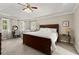 A spacious primary bedroom with tray ceilings and a ceiling fan at 2789 Brookcliff Lndg, Marietta, GA 30062