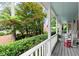 Relaxing front porch with rocking chairs and an American flag waving in the breeze at 2789 Brookcliff Lndg, Marietta, GA 30062