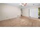 Neutral bedroom featuring carpet, sliding door to the backyard and view to backyard at 4062 Plantation Dr, Marietta, GA 30062