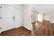 Front foyer featuring double doors, hardwood floors, and access to other rooms at 4062 Plantation Dr, Marietta, GA 30062