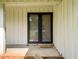 The front door of this home has a modern design that creates an inviting entry at 4062 Plantation Dr, Marietta, GA 30062
