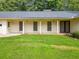 Close up of the long and inviting front porch area of this well-maintained home at 4062 Plantation Dr, Marietta, GA 30062