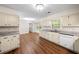 Open concept kitchen featuring stainless steel appliances and a dining area at 4062 Plantation Dr, Marietta, GA 30062