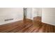 Living room shows laminate flooring and a view of two other rooms at 4062 Plantation Dr, Marietta, GA 30062
