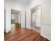 View of a living room featuring hardwood floors and view of the backyard through a window at 4062 Plantation Dr, Marietta, GA 30062