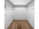 Walk-in Closet features brown carpet and white shelving at 4062 Plantation Dr, Marietta, GA 30062