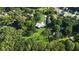 Aerial view of property, highlighting the secluded and lush wooded surroundings at 48 Old Canton Ne Rd, Cartersville, GA 30121