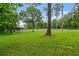 Expansive backyard provides plenty of space for recreation and outdoor activities at 48 Old Canton Ne Rd, Cartersville, GA 30121