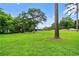 Large, well-maintained backyard with mature trees, offers plenty of space and privacy at 48 Old Canton Ne Rd, Cartersville, GA 30121