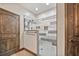 Stylish bathroom shower with gray horizontal tiling, glass door, and rustic wood accents at 48 Old Canton Ne Rd, Cartersville, GA 30121