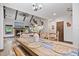 A beautifully decorated dining area featuring a rustic table setting and open view to the living room at 48 Old Canton Ne Rd, Cartersville, GA 30121
