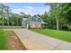 Beautiful home with stone and siding, long driveway, and ample yard space at 48 Old Canton Ne Rd, Cartersville, GA 30121