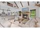 Open-concept living space with a fireplace, stainless steel appliances, and cozy seating at 48 Old Canton Ne Rd, Cartersville, GA 30121
