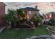Spacious backyard with a wooden deck, lush lawn, and stone landscaping, perfect for outdoor entertaining and relaxation at 1029 Fairway Ne Ests, Atlanta, GA 30319