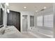 Modern bathroom features double sinks, soaking tub, shower, and ample storage, creating a spa-like retreat at 1029 Fairway Ne Ests, Atlanta, GA 30319