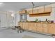 Garage with an abundance of built-in storage, work surface, sink, and two entry doors at 1029 Fairway Ne Ests, Atlanta, GA 30319