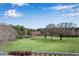 Scenic outdoor green space featuring trees and a serene pond at 1029 Fairway Ne Ests, Atlanta, GA 30319
