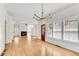 Spacious living room with hardwood floors, a fireplace, and ample natural light at 1029 Fairway Ne Ests, Atlanta, GA 30319