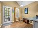 Breakfast nook featuring a French door to the porch, wood-look floors and natural light at 47 Powder Springs St, Hiram, GA 30141