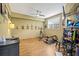 Home gym featuring exercise equipment, trophies, and a ceiling fan for a comfortable workout space at 47 Powder Springs St, Hiram, GA 30141