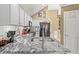 Stylish kitchen features granite countertops and stainless steel appliances at 47 Powder Springs St, Hiram, GA 30141