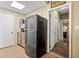 Functional kitchenette area with essential appliances and a doorway leading to other rooms at 47 Powder Springs St, Hiram, GA 30141