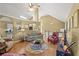 Cozy living room features vaulted ceiling, fireplace, and wood floors at 47 Powder Springs St, Hiram, GA 30141