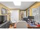 Office space features a large desk, neutral walls, and an office chair at 47 Powder Springs St, Hiram, GA 30141
