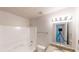 A modern bathroom featuring a shower-tub combo and vanity with granite countertop at 625 Compton Ln, Mcdonough, GA 30253