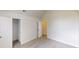 A bright bedroom is seen with a closet and a light gray carpet at 625 Compton Ln, Mcdonough, GA 30253