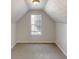 Cozy carpeted bedroom with a window, offering a private retreat at 625 Compton Ln, Mcdonough, GA 30253