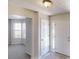 Inviting entryway with neutral colors, tiled floors, and ample natural light at 625 Compton Ln, Mcdonough, GA 30253