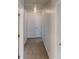 Well-lit upstairs hallway with carpet, leading to multiple rooms at 625 Compton Ln, Mcdonough, GA 30253