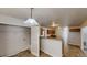 Adjoined laundry space with ample natural light and textured ceilings, adjacent to the eat-in kitchen at 625 Compton Ln, Mcdonough, GA 30253