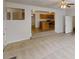 View from the living room to the adjacent kitchen area, featuring stainless steel appliances at 625 Compton Ln, Mcdonough, GA 30253