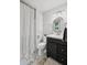 Cozy bathroom with vanity and shower/tub combo at 115 Leaf Lake Dr, Suwanee, GA 30024