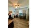 Bedroom featuring wood-look flooring, a ceiling fan and bright walls at 160 Springdale Ct, Newborn, GA 30056