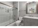 Modern bathroom featuring a tiled shower with glass door and a stylish vanity at 3699 Canyon Ridge Ne Ct, Brookhaven, GA 30319
