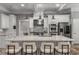 Spacious kitchen features an oversized island with seating, stainless appliances, and ample counter space at 3699 Canyon Ridge Ne Ct, Brookhaven, GA 30319