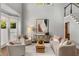 Bright living room with large windows, neutral color palette, hardwood floors, and comfortable seating at 3699 Canyon Ridge Ne Ct, Brookhaven, GA 30319