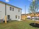 Backyard featuring a well-maintained lawn and a privacy fence at 5623 Hislop Ln # 84, Mableton, GA 30126