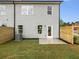 Backyard features a well-maintained lawn and a privacy fence at 5623 Hislop Ln # 84, Mableton, GA 30126